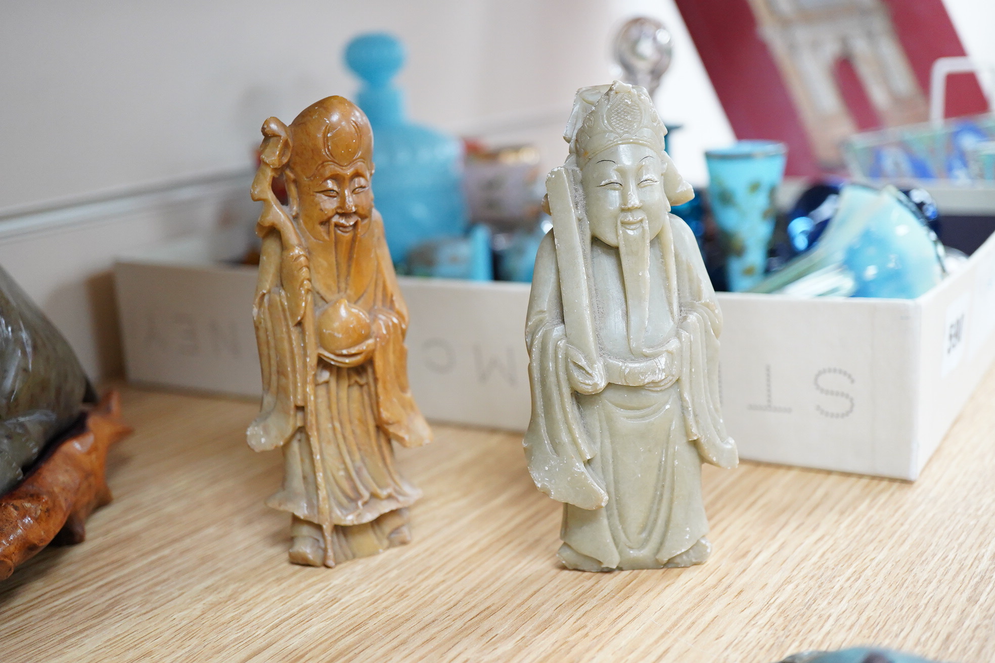 A group of Chinese collectables to include a soapstone carving of a ram, crackle glaze vase and figures of elders, largest 23cm wide